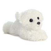 A white puppy plush from Mini Flopsie stuffed animals with a soft body and an endearing expression
